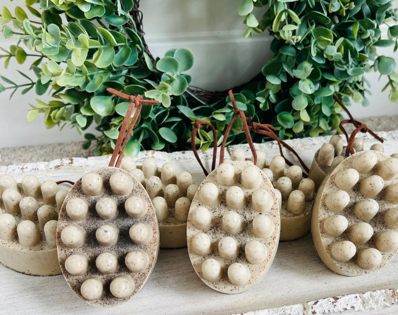 Oval coffee massage soap bars with leather cord hangers
